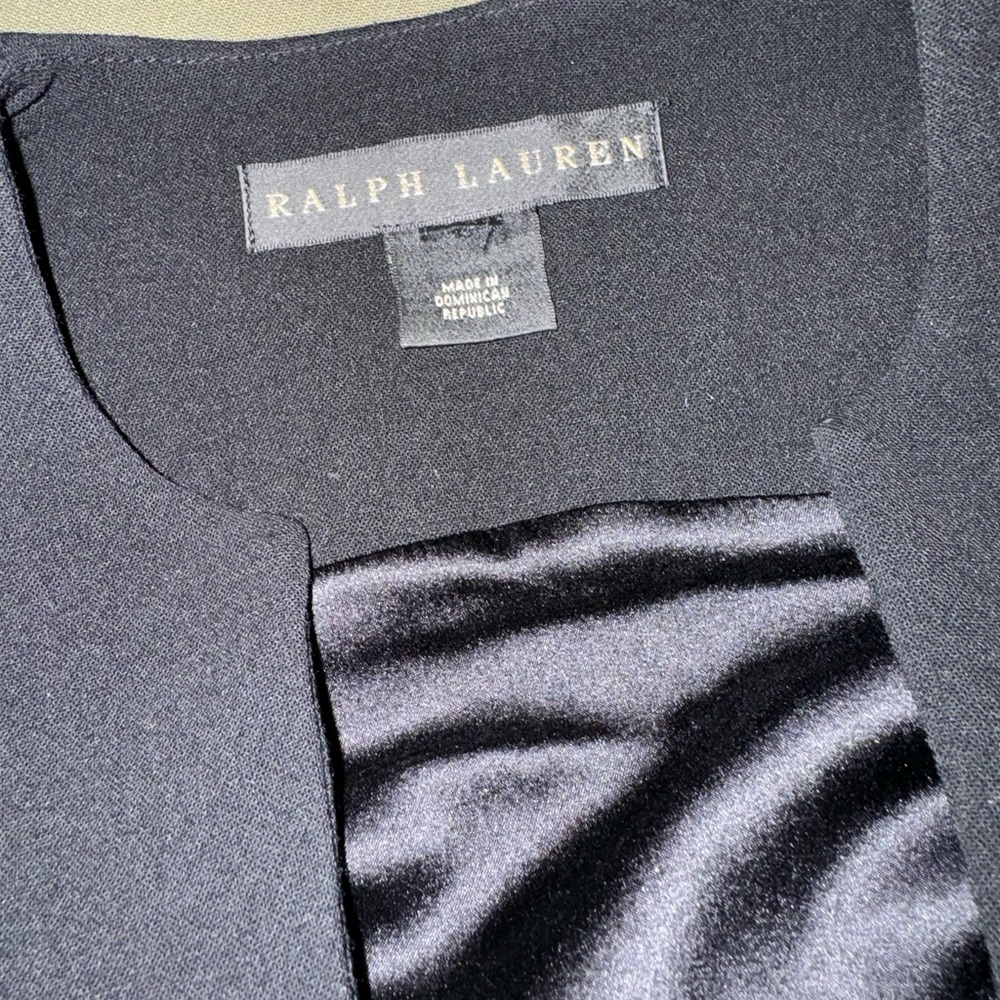 Ralph Lauren black cocktail dress. Sleeveless with interesting front detail
